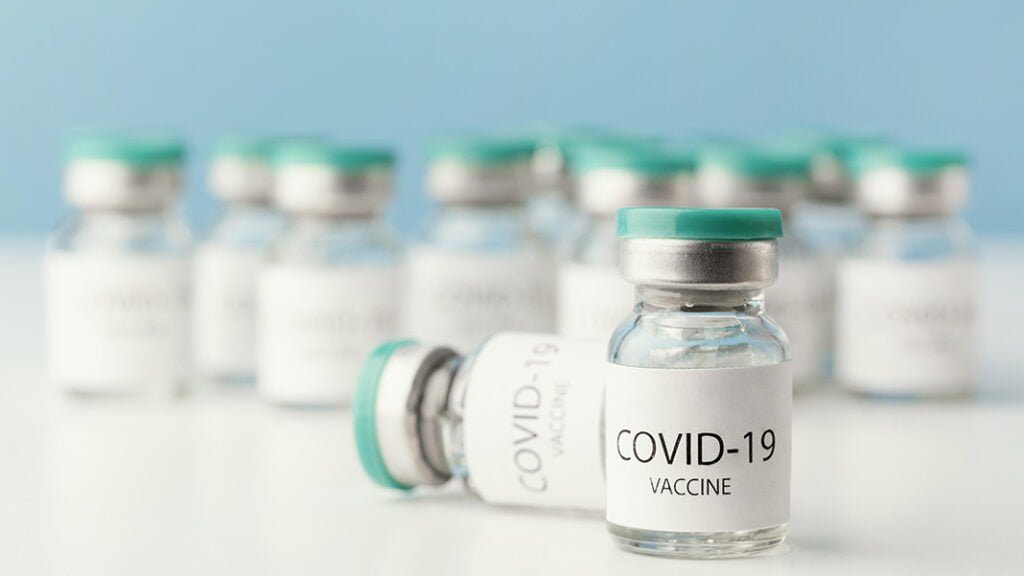 arrangement-with-coronavirus-vaccine-bottle